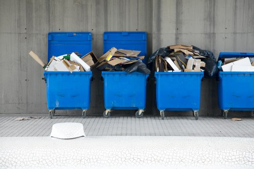 Business professionals managing waste in an office setting in Hounslow